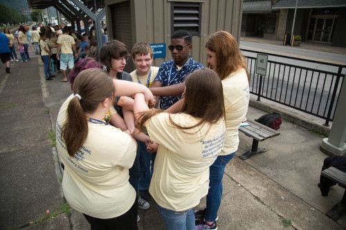 students playing human knot game