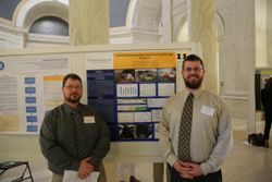 WVU Tech students Matthew Cole (L) and Sam Jarrell (R) share their
work at Undergraduate Research Day 