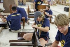 students assembling furniture