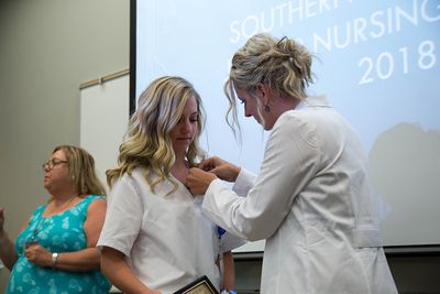 A junior nurse is pinned during the SWVJNA pining ceremony.