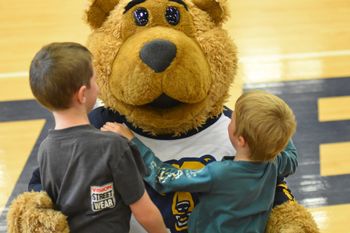 Monty mingle with attendees at the Homecoming basketball game.