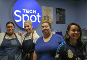 Tech Spot employees at the new cafe.