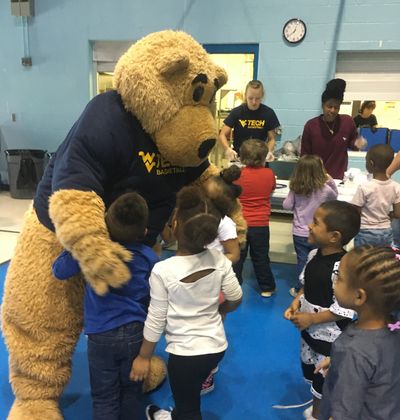 WVU Tech mascot Monty greets children at a local school.