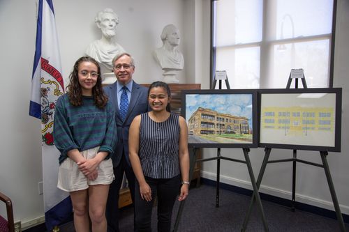 Student art competition winners pose for a photo with Dean Stephen Brown.