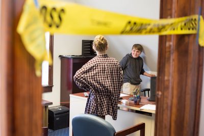 Forensic Camp student Jed White works to investigate a crime scene.