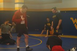 Taylor works with WVU Tech wrestlers during his visit.