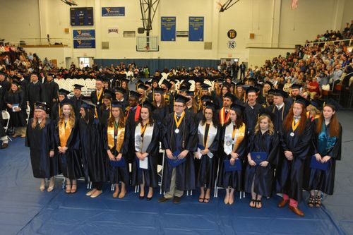 Graduates of the class of 2017 stand during WVU Tech's 118th commencement cermony