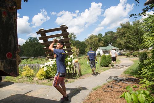 A WVU Tech student helps clean up during flood relief efforts