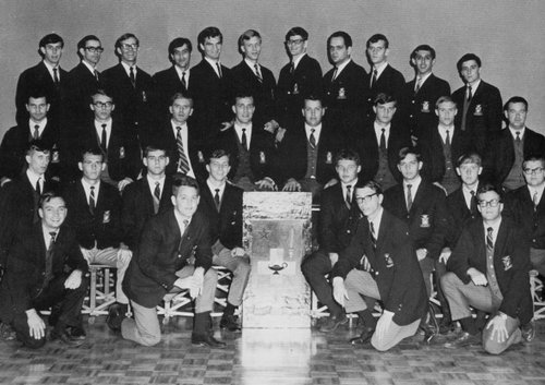 Black and white photo from a WVU Tech yearbook of a group of men in a fraternity