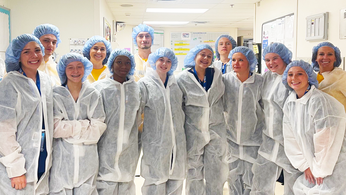 A group of junior nursing students dressed in PPE